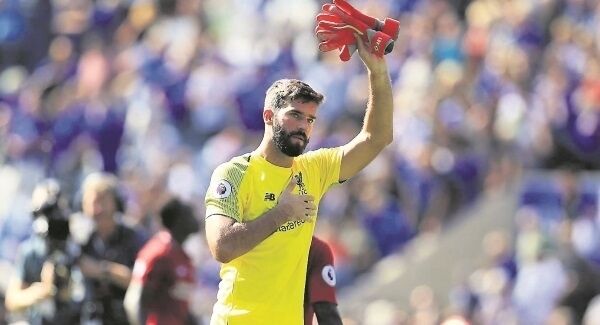 Liverpool goalkeeper Alisson acknowledges the fans after the Premier League match at the King Power Stadium. Pic: PA
