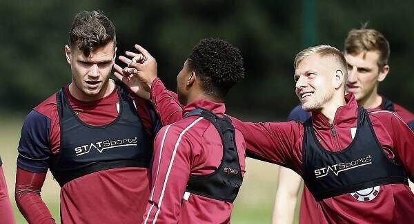 Ireland international Kevin Long, left, gets one in the ear from his teammates at Burnley training yesterday. Burnley face Olympiakos in the Europa League tonight. Picture: Martin Rickett Ireland international Kevin Long, left, gets one in the ear from his teammates at Burnley training yesterday. Burnley face Olympiakos in the Europa League tonight. Picture: Martin Rickett