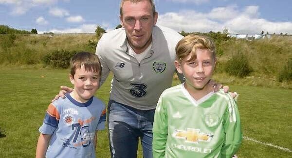 Richard Dunne poses for a picture with Cillian Ronan and Mike Ross at yesterday’s ‘Football Memories’ programme at Bandon AFC’s Festival of Football. Picture: Denis Boyle.