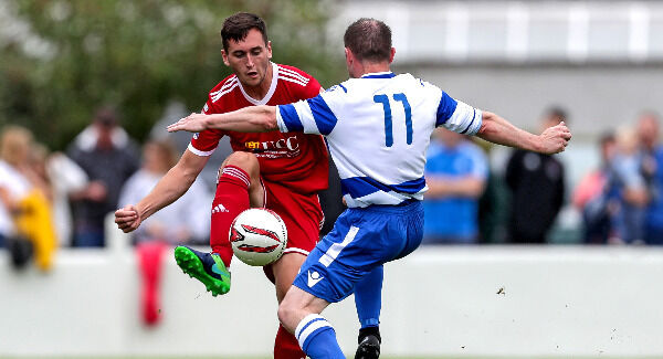 Cork City's Conor McCarthy and Christy Doran of Home Farm. Photo: INPHO/Laszlo Geczo