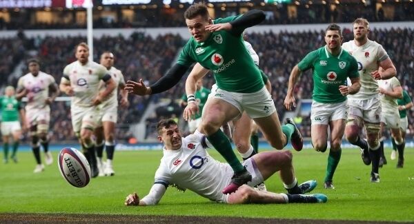 Jacob Stockdale on his way to scoring Ireland's third try. Pic: INPHO/Billy Stickland