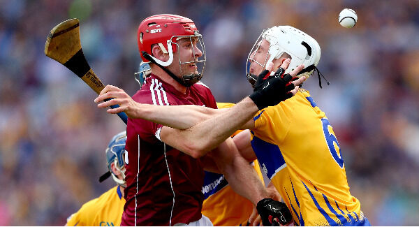 Galway's Jonathan Glynn and Conor Cleary of Clare. Photo:INPHO/James Crombie