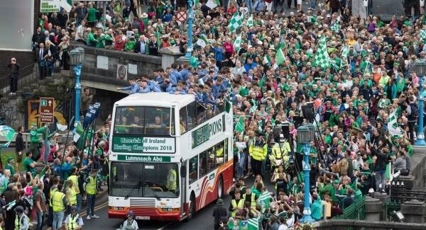 The Limerick Hurling team make their way over Sarsfield Bridge and the river Shannon en route to the homecoming celebrations at the Gaelic Grounds. Photo: Eamon Ward