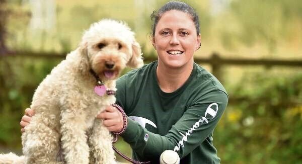 Cork camogie star Gemma O'Connor relaxes with her dog Molly on the Clogheenmilcon walkway near Blarney.Pic: Eddie O’Hare