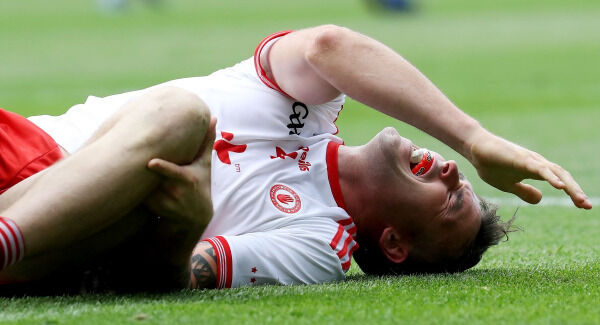 Tyrone's Cathal McCarron goes down injured. Pic: INPHO/Bryan Keane Tyrone's Cathal McCarron goes down injured. Pic: INPHO/Bryan Keane