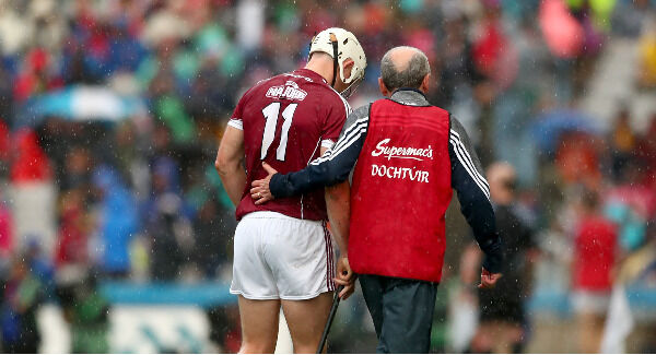 Galway's Joe Canning leaves the field injured. Photo: INPHO/James Crombie