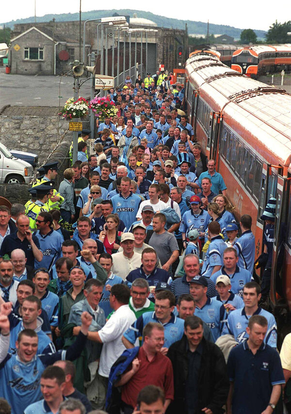 Dublin supporters arrive at Thurles train station ahead of their drawn 2001 All-Ireland SFC quarter-final clash with Kerry.