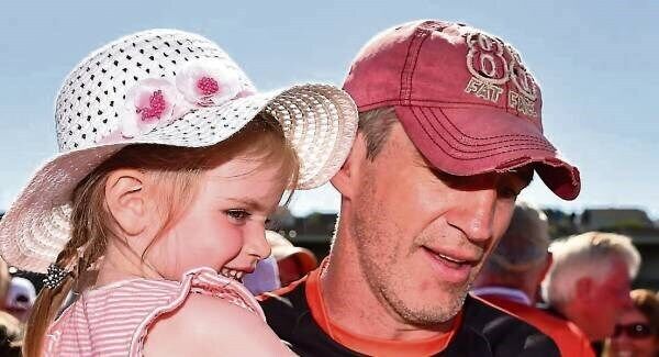 Armagh manager Kieran McGeeney with his daughter Leah, 3,after his side came from behindto beat Clare in the All-Ireland SFC Round 3 Qualifier at the Athletic Grounds, Armagh. Picture: Seb Daly