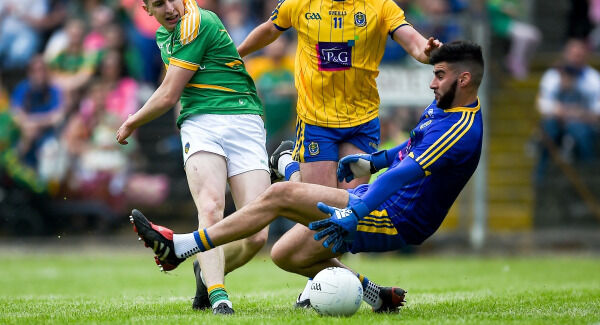 Leitrim's Jack Heslin with Colm Lavin of Roscommon. Pic ©INPHO/Tommy Grealy Leitrim's Jack Heslin with Colm Lavin of Roscommon. Pic ©INPHO/Tommy Grealy