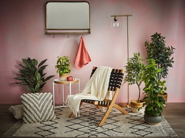 Folding Couple Chair €125; Hooked Brass Mirror €200; Brass Floor Lamp €75; Folding Table €50; Alina Cushion €30