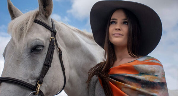 The Vermillion scarf by Gill O’Shea, retailing at €89 with €5 going to the ISPCA, modelled here by Orfhlaith Hennessy. Picture: Taine King Photography.