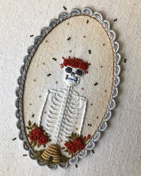 An embroidered artwork by Britt Hutchinson by Tinycup Needleworks.
