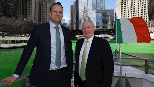Taoiseach Leo Varadkar with Minister for Rural and Community Development Michael Ring during the Tourism Ireland Green Boat Trip in Chicago. Photo: Brian Lawless/PA