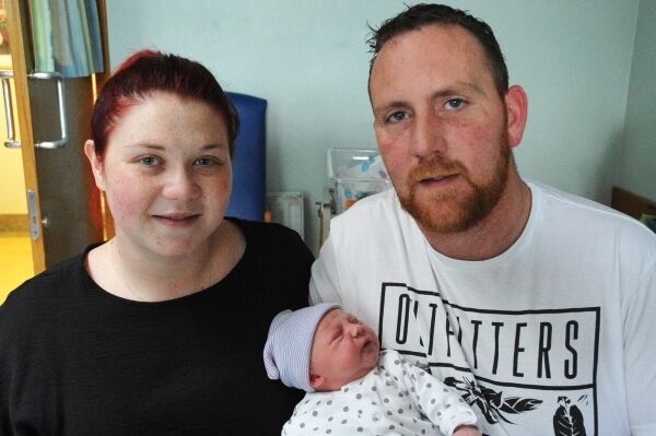 Parents Michelle Montague and Simon Cox with newborn Maeve. Parents Michelle Montague and Simon Cox with newborn Maeve.