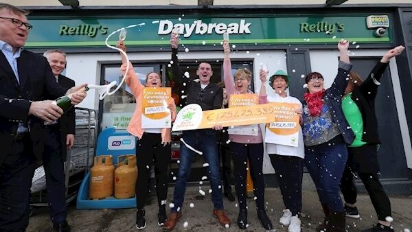 Michael Hayes of the National Lottery sprays the champagne with Les Reilly, owner with his staff, Carly Reilly Flynn, Martina White, Louise Costello and Ann Morgan celebrate at the Reilly's Daybreak shop, in The Naul, North County Dublin who sold last night's winning €175 Million winning Euromillions winning ticket, the largest jackpot ever won in Ireland...Picture Colin Keegan, Collins Dublin