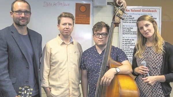 At Cashel Community School, Co Tipperary, having performed music by Cork composer Ian Wilson were, from left: guitarist Chris Montague, composer Ian Wilson, double bass Conor Chaplain, and vocalist Lauren Kinsella.