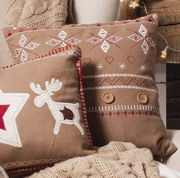 Try something festive which is brought out just once a year and becomes a tradition, like these naïve-style appliqué cushions from Aoki (€25 each) Try something festive which is brought out just once a year and becomes a tradition, like these naïve-style appliqué cushions from Aoki (€25 each)