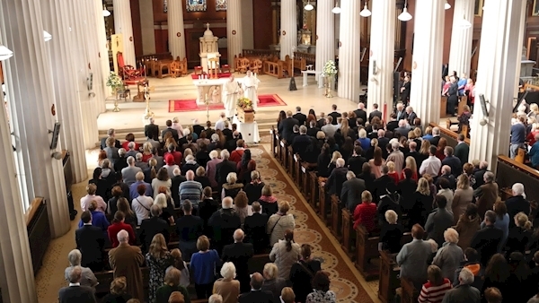 Mourners told Emma Mhic Mhathúna gave the nation 'courage and strength'