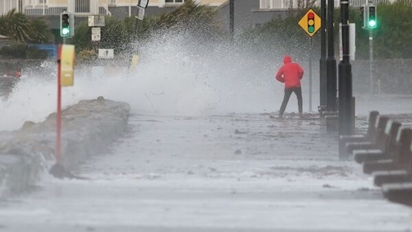 A man avoids the waves at Salthill promenade, Co Galway during Storm Callum. Pic: Brian Lawless/PA Wire A man avoids the waves at Salthill promenade, Co Galway during Storm Callum. Pic: Brian Lawless/PA Wire