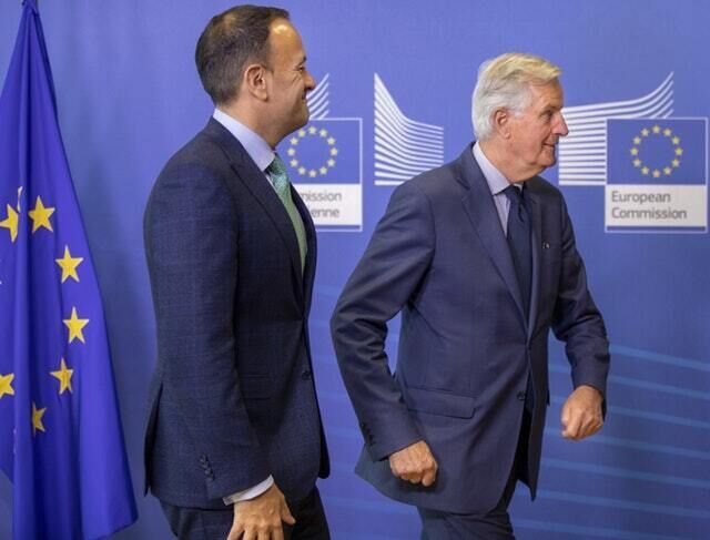 Leo Varadkar with EU chief Brexit negotiator Michel Barnier on Thursday (Olivier Matthys/AP)