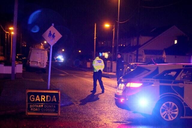 Garda at the scene of a shooting in west Dublin (Brian Lawless/PA)