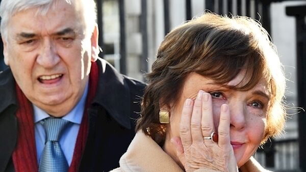 Dana Rosemary Scallon leaves Belfast High Court today, followed by her husband Damien. Pic: Photopress Dana Rosemary Scallon leaves Belfast High Court today, followed by her husband Damien. Pic: Photopress