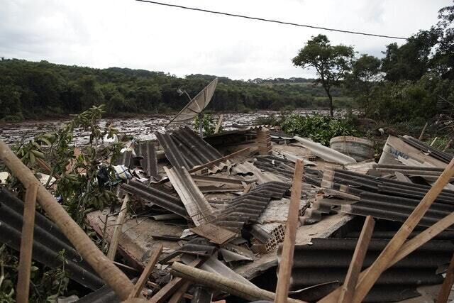 This house was completely destroyed by the flow of mining waste (AP) This house was completely destroyed by the flow of mining waste (AP)