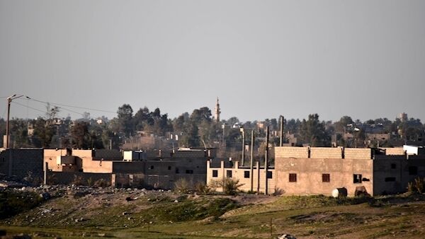 A general view showing Baghouz town eastern Syria. EPA/MURTAJA LATEEF.