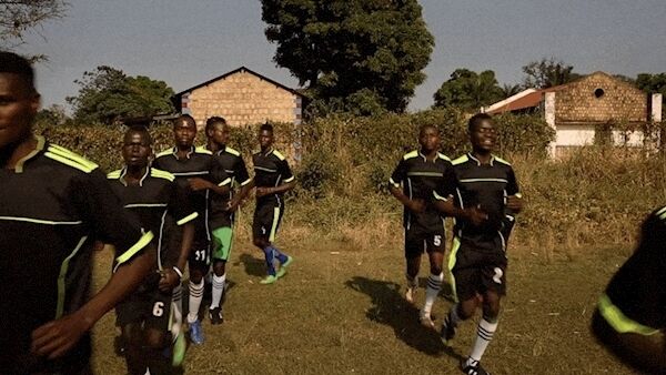 Teenagers from Yambio, including former child soldiers, warm up ahead of a football game. Picture: MSF