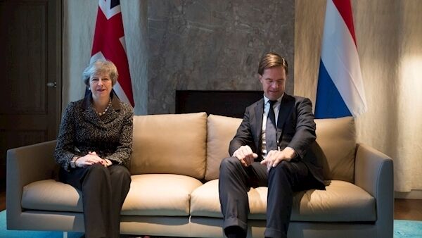 British Prime Minister Theresa May and Dutch Prime Minister Mark Rutte at the start of a meeting in The Hague this morning. Pic: AP Photo/Peter Dejong, Pool