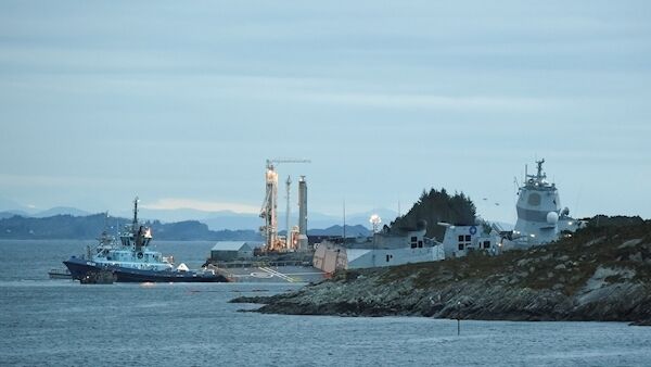 The Norwegian frigate KNM Helge Ingstad takes on water after a collision with the tanker Sola TS, in Oygarden, Norway, Thursday Nov. 8, 2018. (Marit Hommedal/NTB Scanpix via AP)