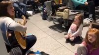 VIDEO: Impromptu sing-song breaks out in Dublin airport during six-hour flight delay
