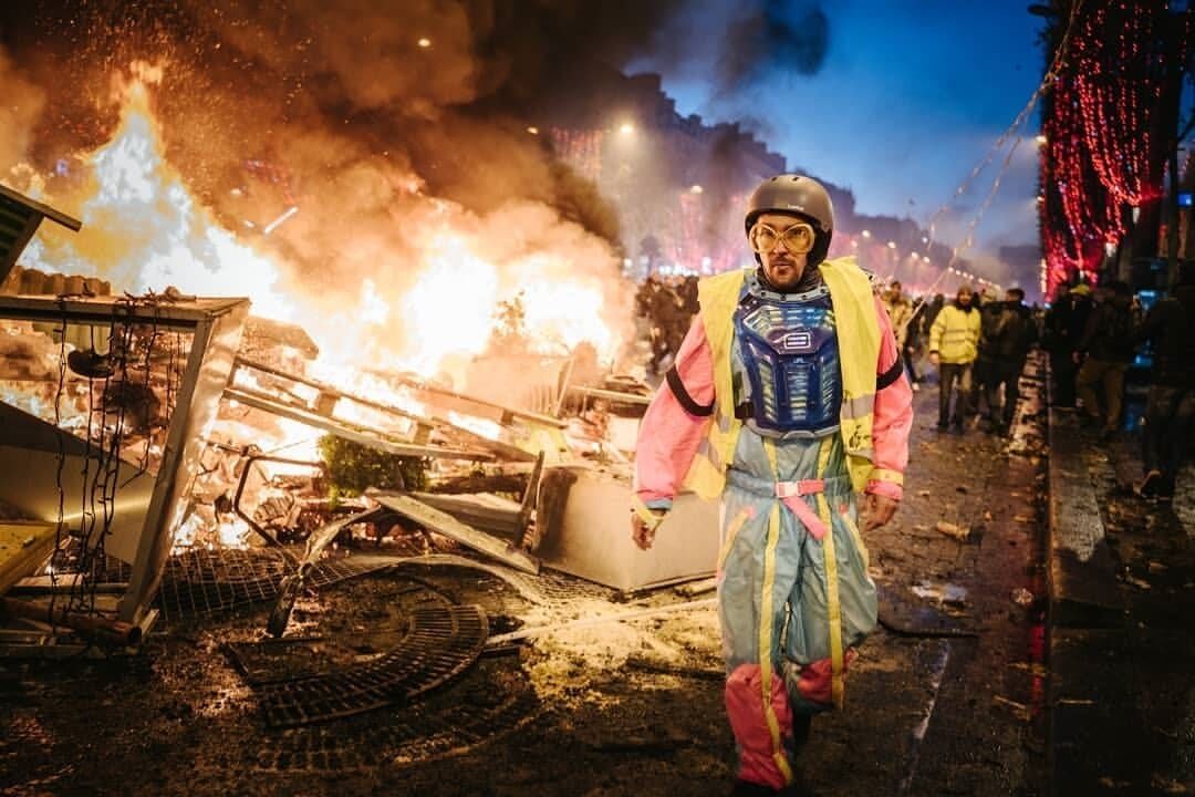 Arnaud Guillard from France took this image during the yellow-vest protest in Paris at the Avenue des Champs Elysées. 2019 Sony World Photography Awards