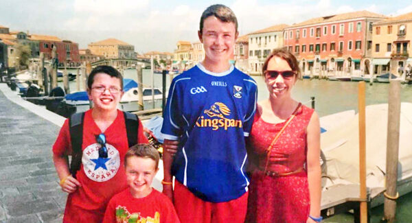 Clodagh Hawe with her sons, Liam, Niall, and Ryan
