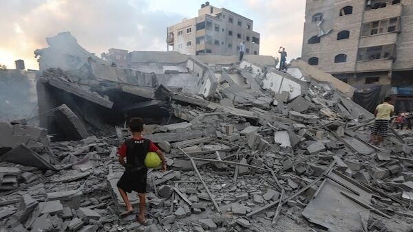A boy stands by the rubble of the Al Mishal Culture Centre, destroyed by Israeli bombs. A boy stands by the rubble of the Al Mishal Culture Centre, destroyed by Israeli bombs.