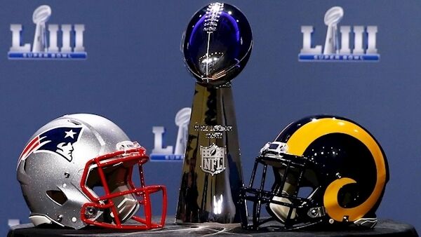 ATLANTA: The Lombardi Trophy and the helmets of the New England Patriots (left) and the Los Angeles Rams prior to tomorrow’s Super Bowl. Picture: Mike Zarrilli/Getty
