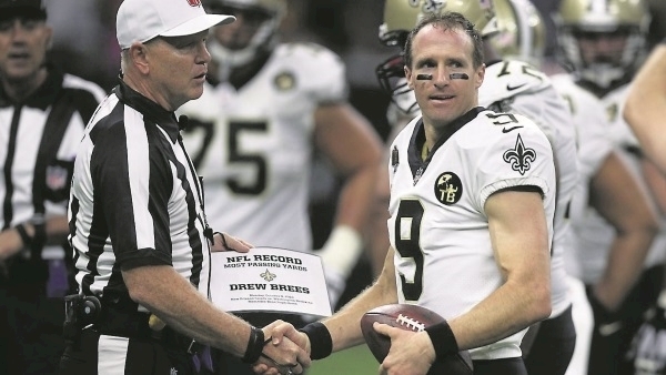 Saints star Brees immortalised after record-breaking display