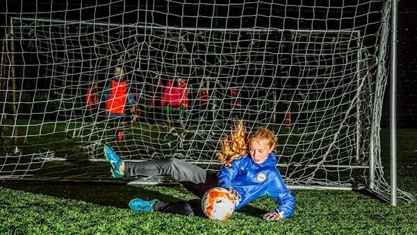 U12 goalkeeper Molly Ryan perfects her technique at training. Picture: Brian Arthur