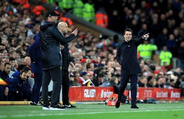 Jurgen Klopp, left, says he apologised to Everton manager Marco Silva, right, on Sunday (Peter Byrne/PA)