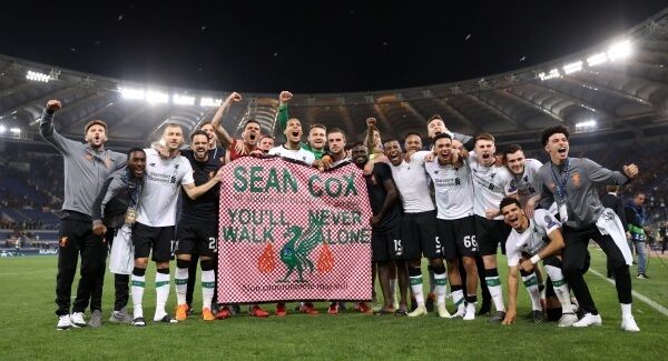 Liverpool players last May holding a banner supporting Sean. Liverpool players last May holding a banner supporting Sean.