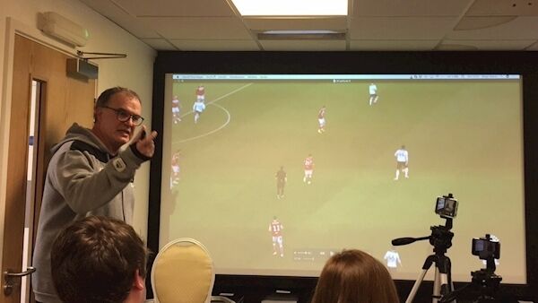 Leeds United manager Marcelo Bielsa gives a PowerPoint presentation to the media during a press conference in Leeds last night. Picture: PA