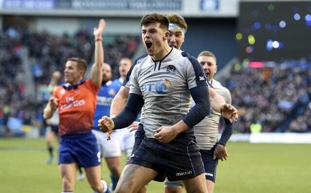 Scotland&rsquo;s Blair Kinghorn celebrates scoring his side&rsquo;s fourth try against Italy (Ian Rutherford/PA)