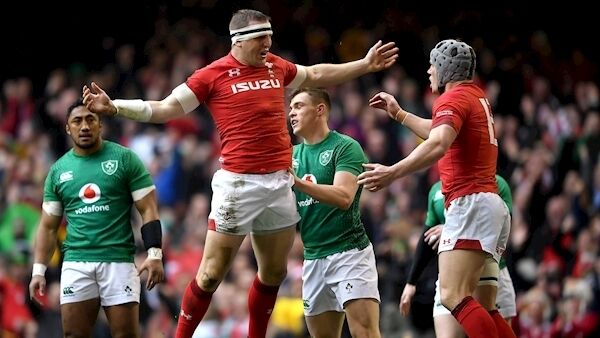 Wales' Hadleigh Parkes celebrates scoring a try with Jonathan Davies. Pic: INPHO/Alex Davidson