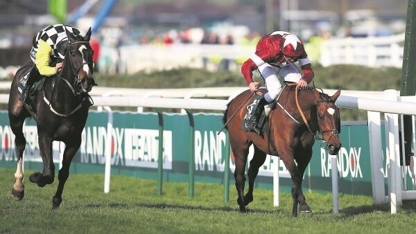 Tiger Roll, right, just repels the fast-finishing Pleasant Company to end Davy Russell’s wait for Aintree Grand National glory last April. Tiger Roll, right, just repels the fast-finishing Pleasant Company to end Davy Russell’s wait for Aintree Grand National glory last April.