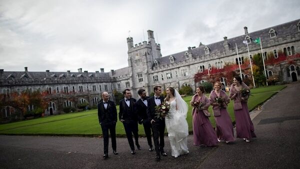 Ileana Wright and Ian Ross with their wedding party at UCC. The couple got engaged while on holiday in Lanzarote. Ileana Wright and Ian Ross with their wedding party at UCC. The couple got engaged while on holiday in Lanzarote.
