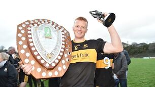 14-man Dr Crokes recover to claim fourth league in a row