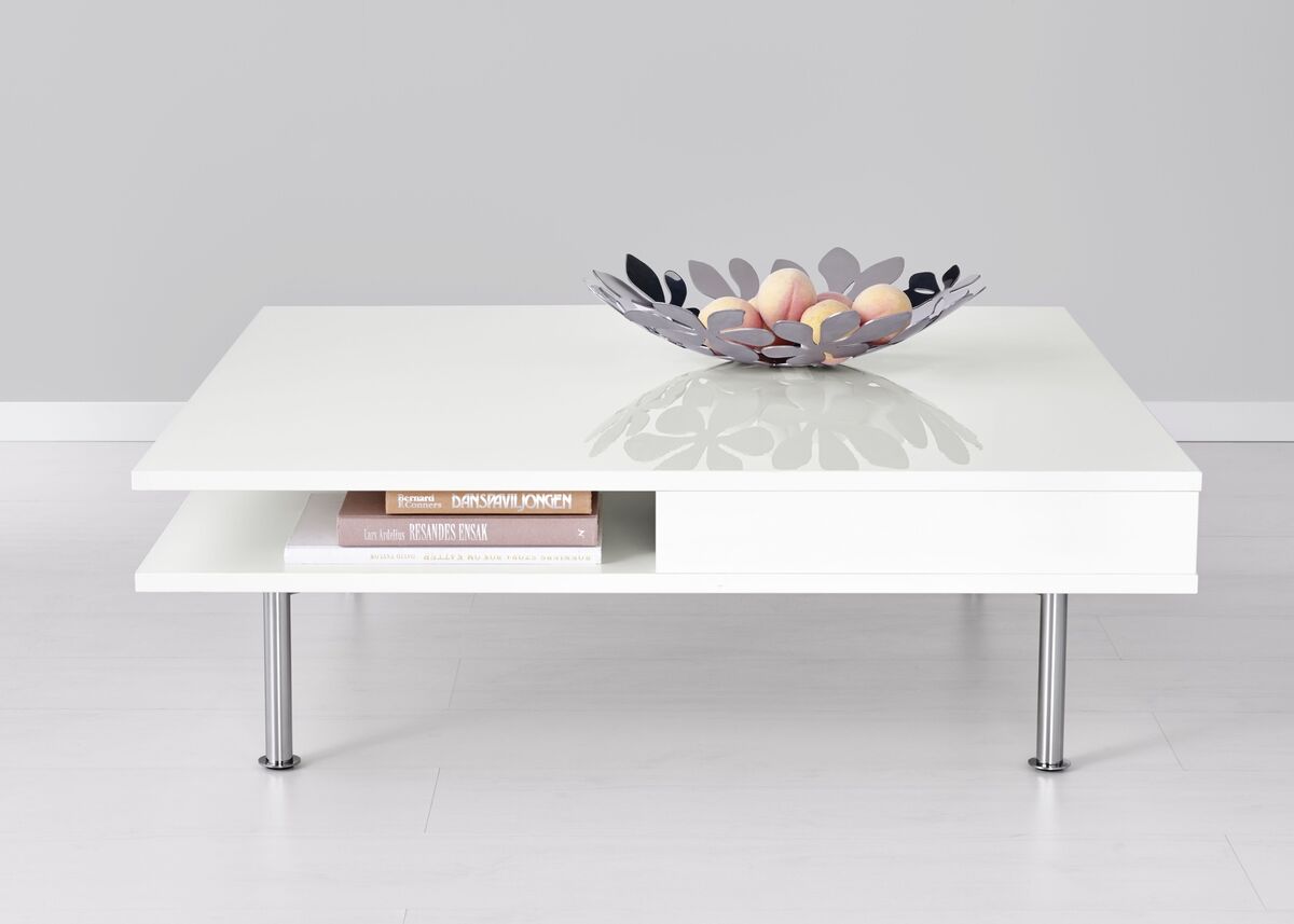 This sleek number comes from Ikea and includes a shelf and drawer space for magazines and remote controls (Tofteryd coffee table €195).