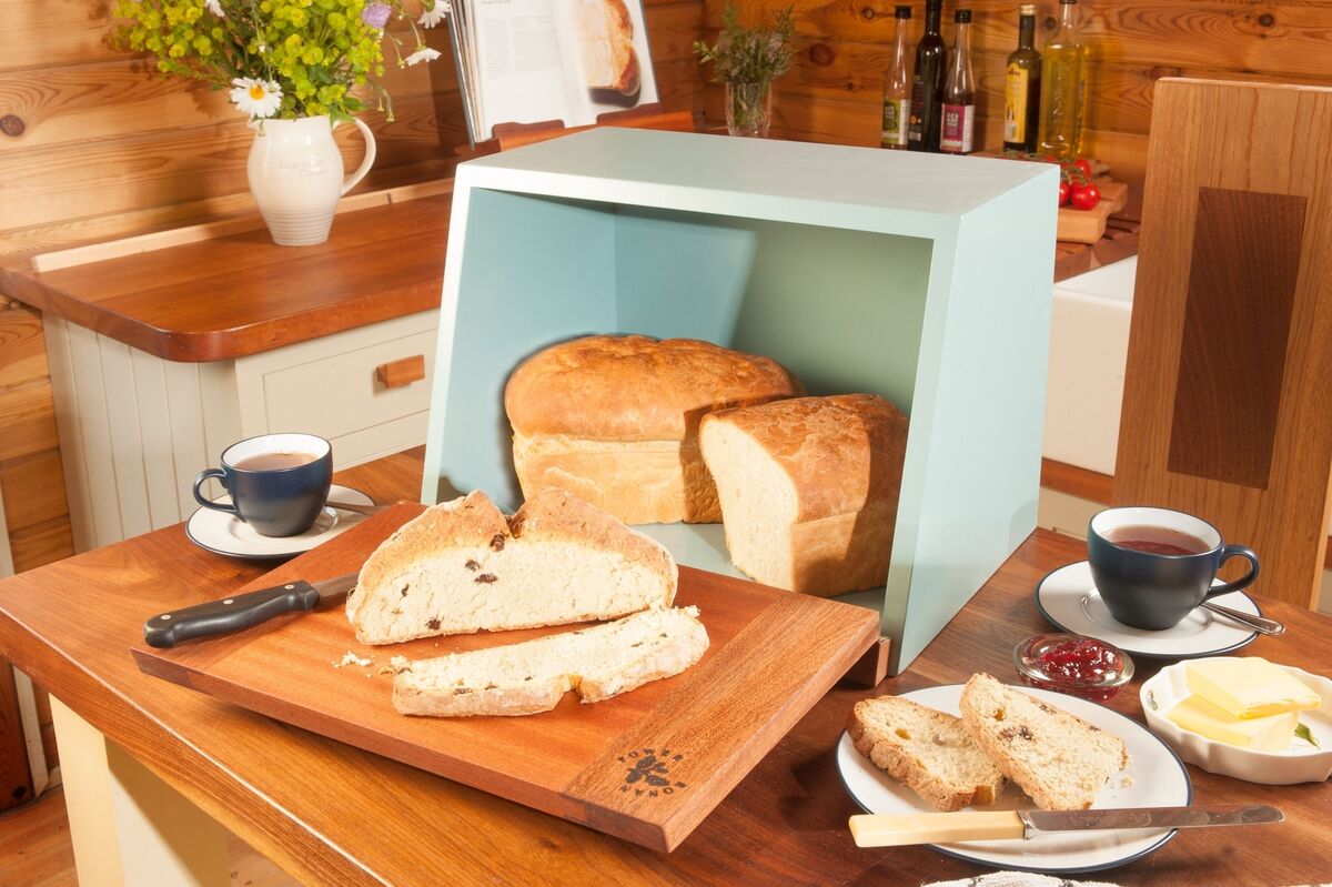 Multi-function comes with this bread bin by Ronan Power. Not only does it store a fresh pan, but also doubles up as a breadboard when the door is open (€100).