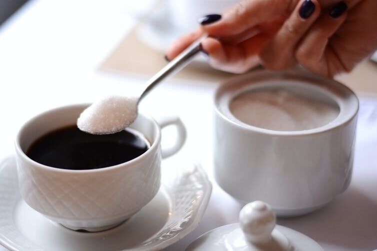 Having a hot drink without sugar is one way of cutting out a regular sugar hit. Eviart/Shutterstock Having a hot drink without sugar is one way of cutting out a regular sugar hit. Eviart/Shutterstock