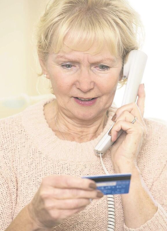 CARD CONTROL: Scammers want you to give details about your debit and credit cards, PIN numbers, online banking details, password, and personal information. Picture: Posed by model